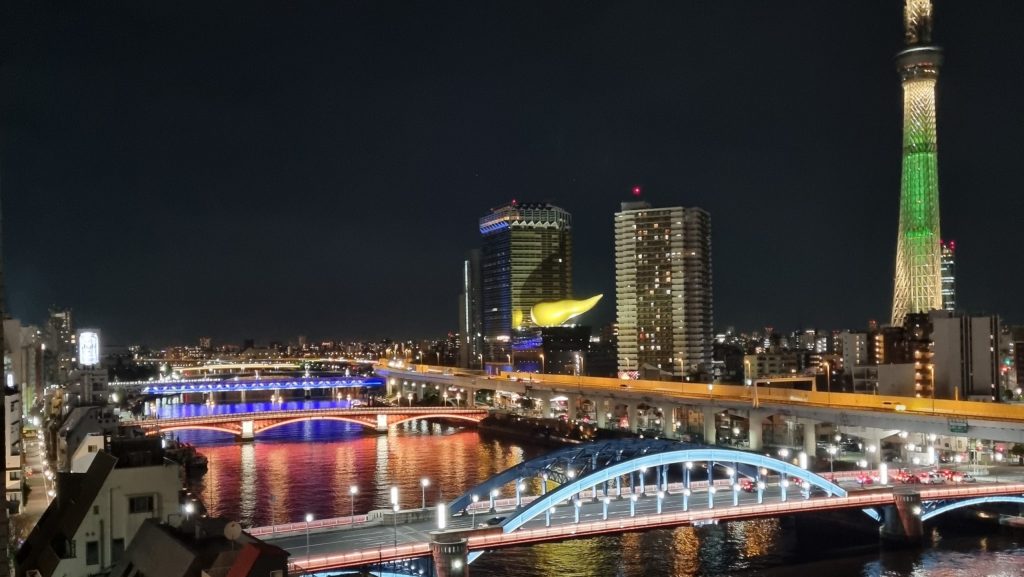 Tokyo skyline with bridge at night – visual theme for company formation and business registration in Japan.